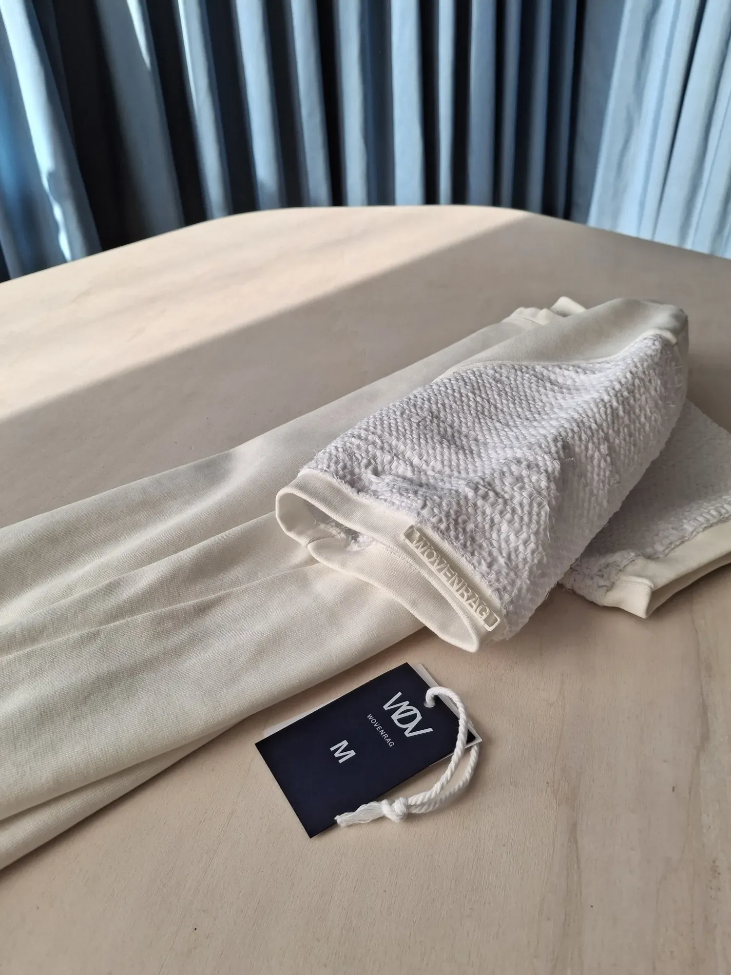 White Solitaire t-shirt — close-up of handwoven sleeve texture